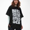 Women Notice The Reckless T-Shirts & Tanks | Here For The Apres Ski Oversized Tee (Black)